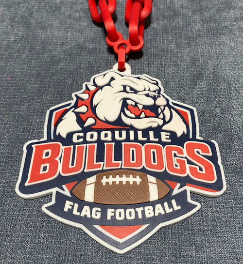 Coquille Bulldogs flag football logo on a red chain. Raised letters and design. 